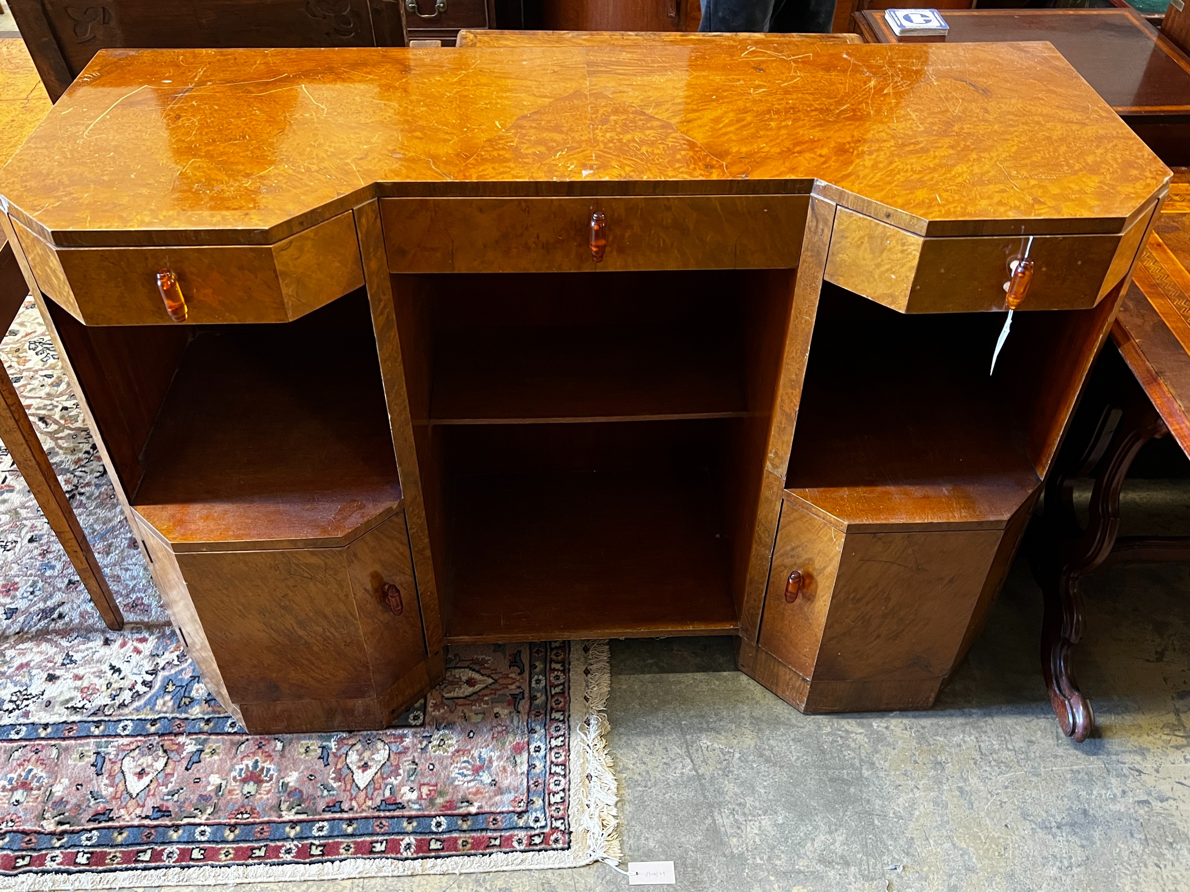 A French Art Deco bird's eye maple side cabinet, width 137cm, depth 51cm, height 97cm